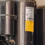 HVAC compressor and copper coil assembly line inside an industrial manufacturing facility