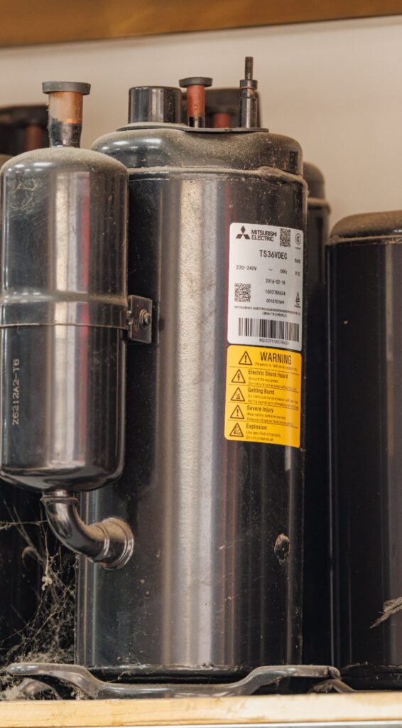 HVAC compressor and copper coil assembly line inside an industrial manufacturing facility