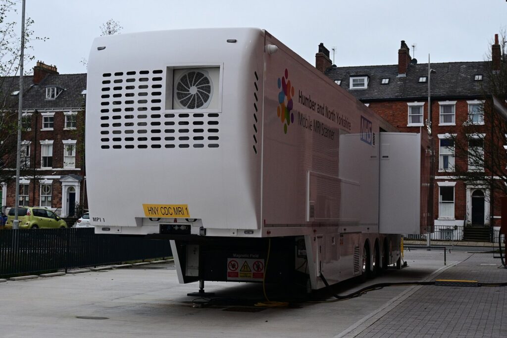 Mobile MRI scanner unit at a UK Community Diagnostics Centre, representing medical imaging equipment exposed to rare earth magnet supply risk