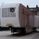 Mobile MRI scanner unit at a UK Community Diagnostics Centre, representing medical imaging equipment exposed to rare earth magnet supply risk