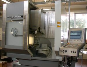 CNC machining center on an industrial machinery shop floor, illustrating industrial machinery supply chain risk