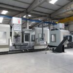 Large CNC milling machines on an industrial machinery factory floor, illustrating EU Machinery Regulation supplier compliance