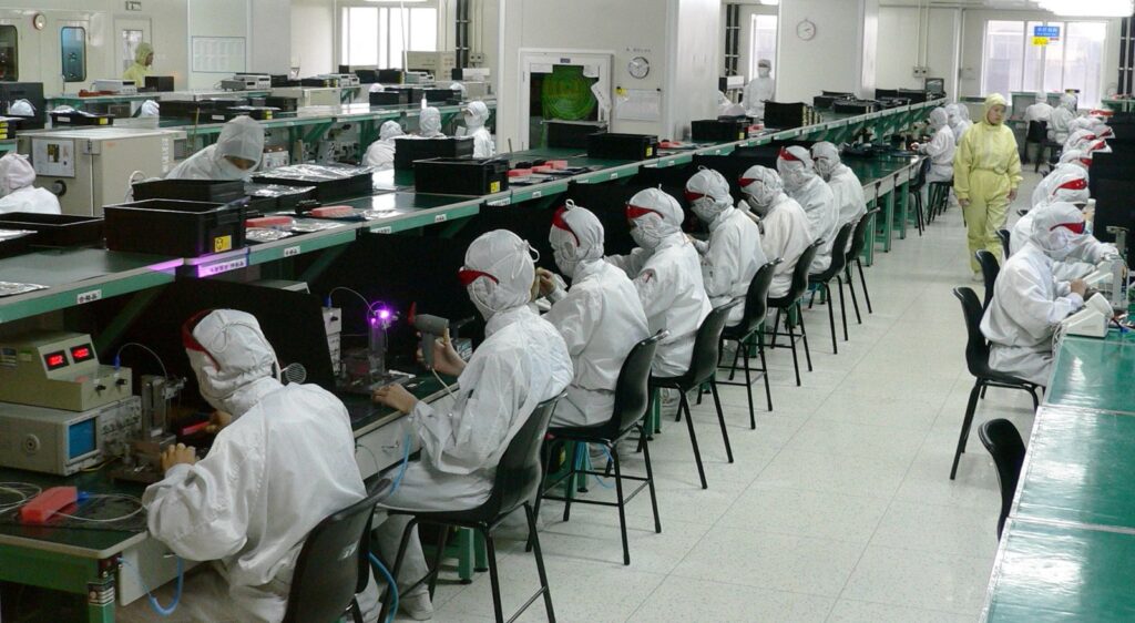 Cleanroom electronics assembly line where component supply drives predictive supply chain analytics for medical device makers